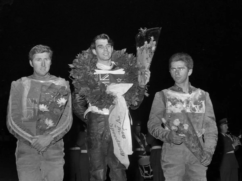 Mauger lifting world title No.1 in Gothenburg in 1968 alongside fellow NZ icon Barry Briggs (left) and Poland's Edward Jancarz (right). PHOTO: The John Somerville Collection