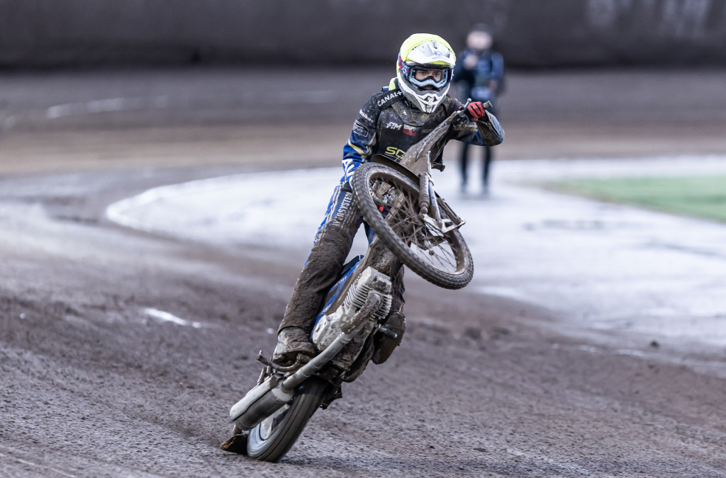 Third-placed Kevin Malkiewicz celebrates on the back wheel. PHOTO: Taylor Lanning